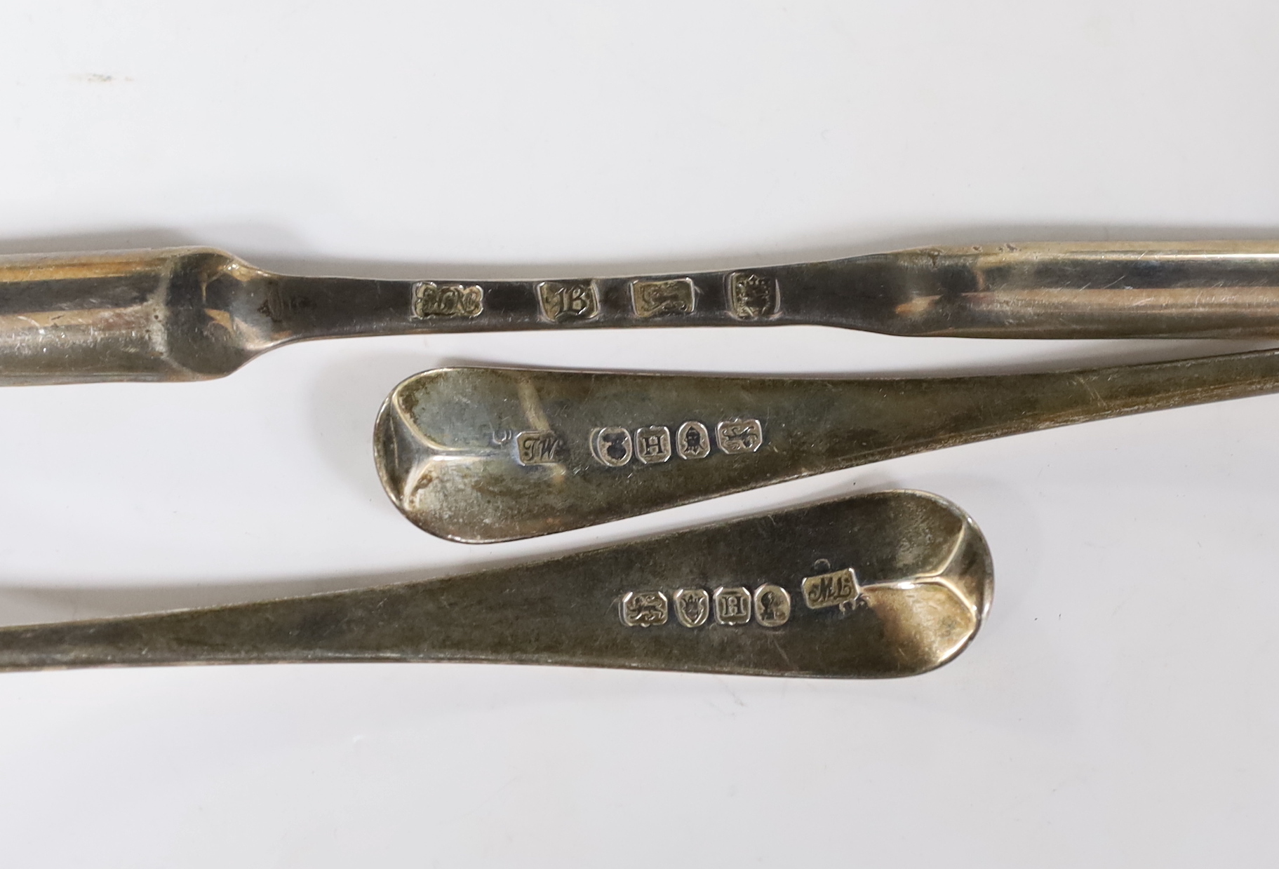 A late George II silver marrow scoop, London, 1757 and a pair of George III silver Old English pattern sauce ladles, London, 1803.